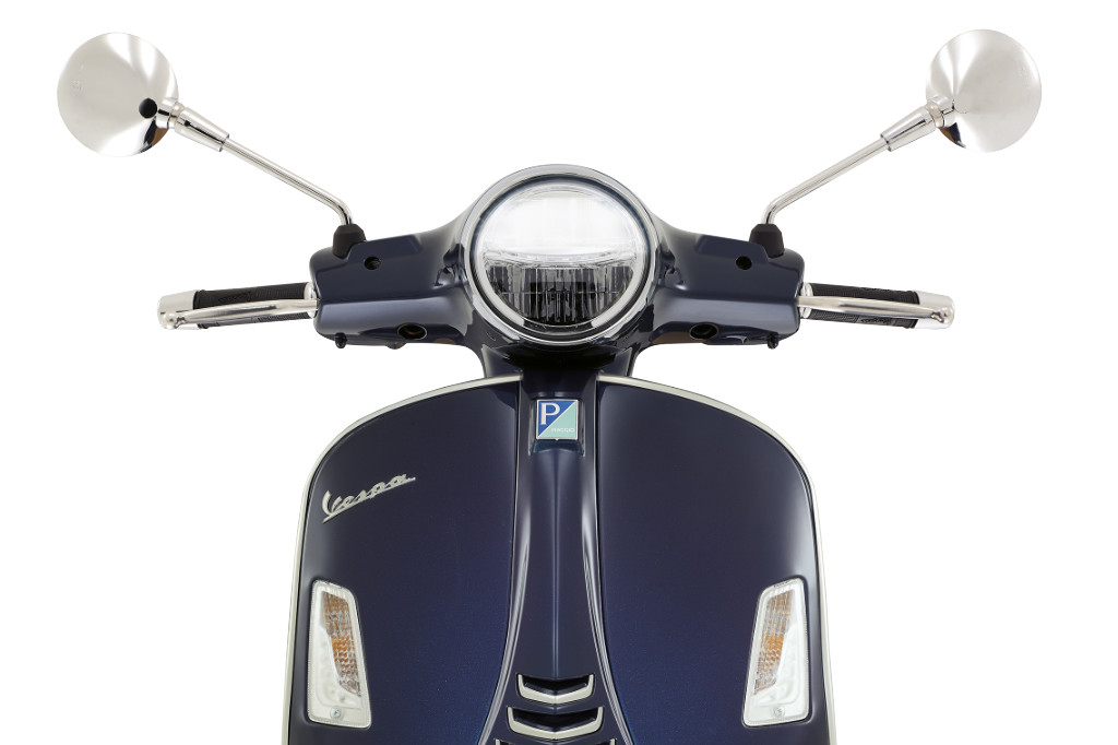 Front view of a blue Vespa GTS