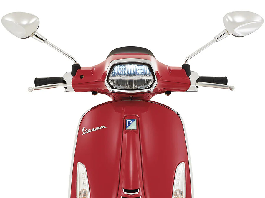 Front view of a red Vespa Sprint