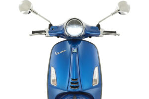 Front view of a blue Vespa Primavera