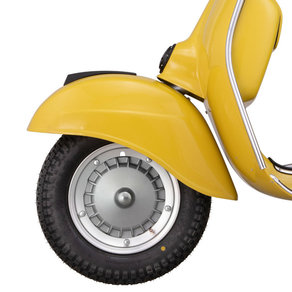 Side view of the front part of a yellow Vespa