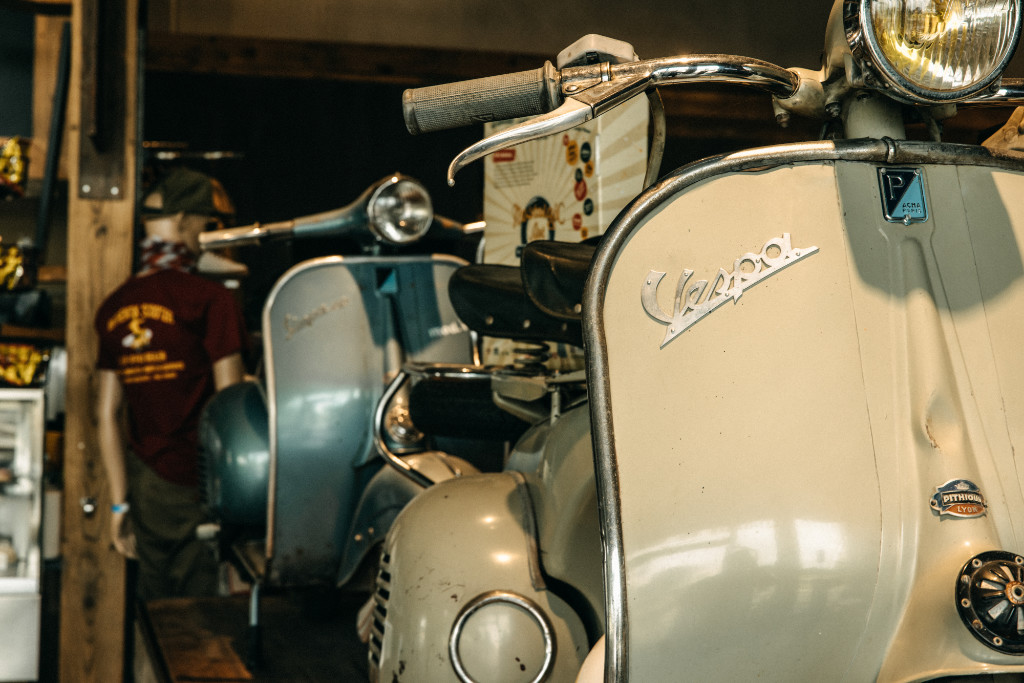 2 old Vespas in the SIP Scootershop Flagship Store