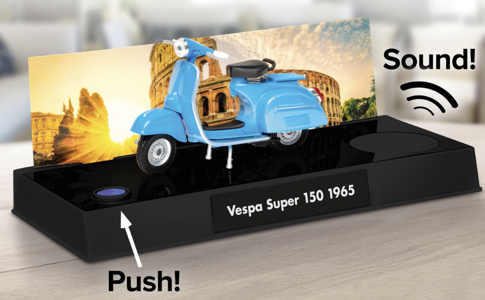 Vespa model on a board with sound effects